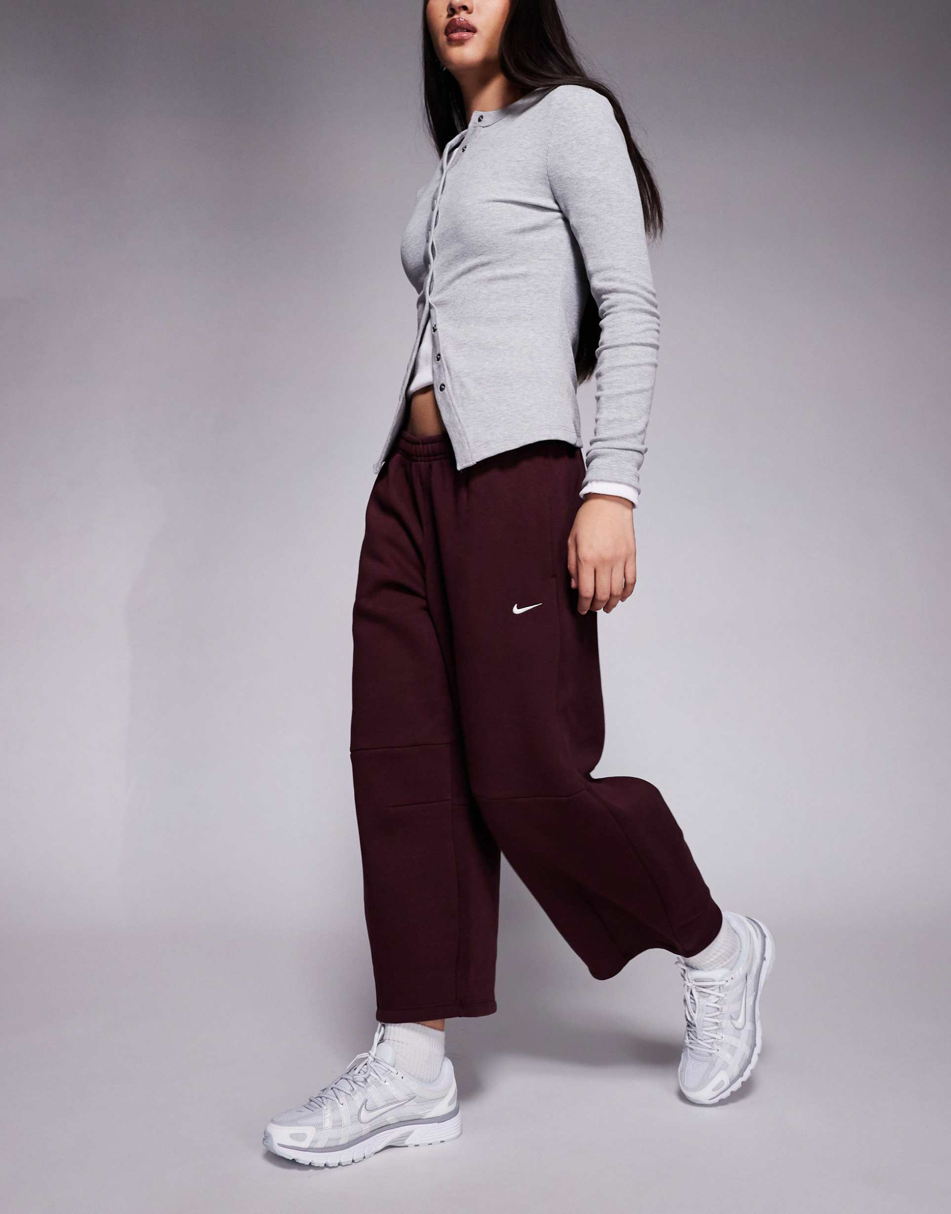 nike phoenix barrel leg pants in burgundy