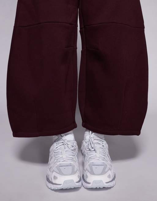 Nike Phoenix barrel leg pants in burgundy, 3 of 5