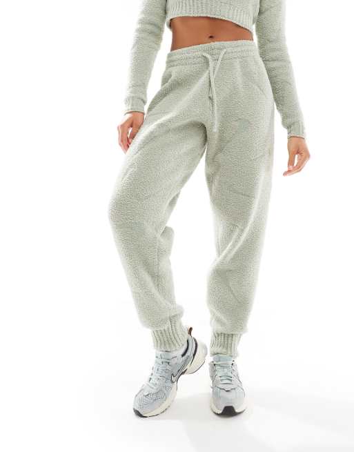 Nike Phoenix Boucle all over print swoosh high-waisted joggers in light green, 2 of 5