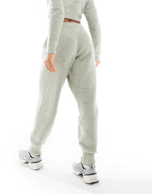 Nike Phoenix Boucle all over print swoosh high-waisted joggers in light green, 4 of 5