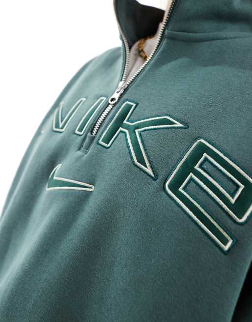 Nike Phoenix Felpa in pile verde con logo e zip corta ASOS