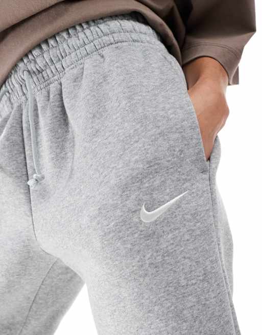 Nike Phoenix Fleece cuffed sweatpants in gray ASOS