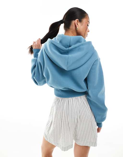 Nike Phoenix Fleece full zip cropped hoodie in blue