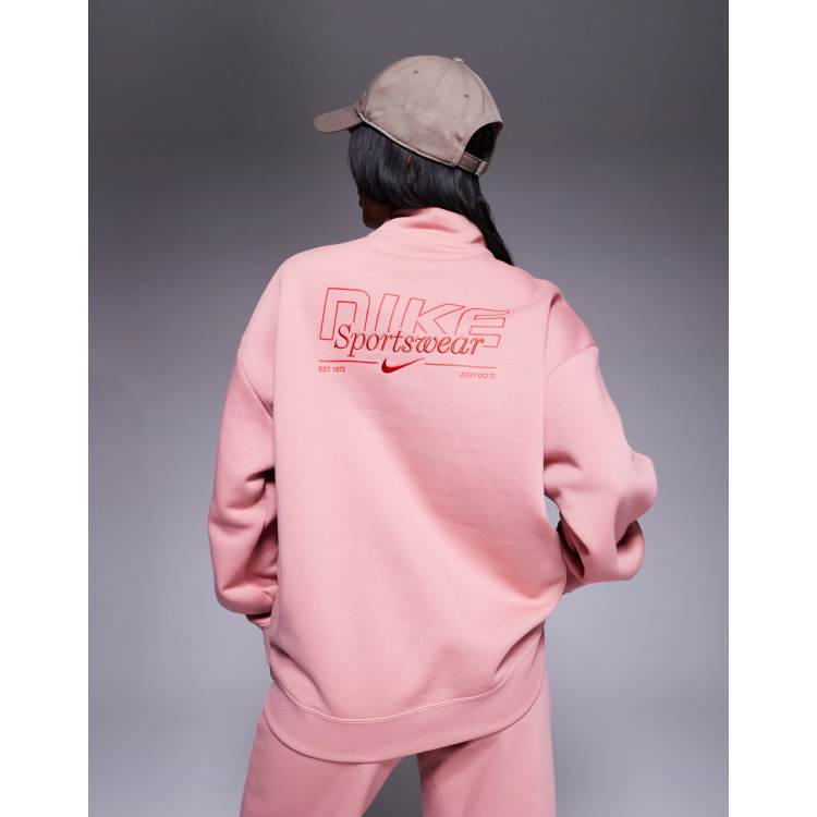 Nike Phoenix Fleece Gym Life Swoosh half zip sweatshirt in pink | ASOS
