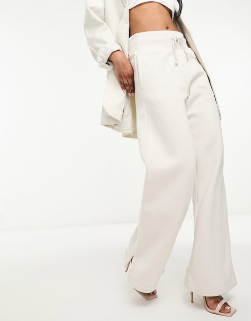 Nike beige wide leg joggers hotsell