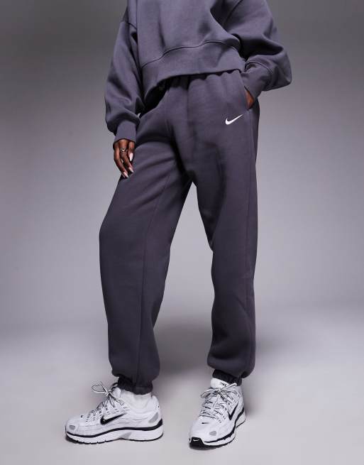 Nike Phoenix Fleece high waisted oversized cuffed joggers in dark