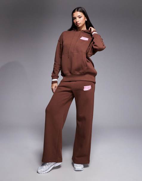 Nike Phoenix Fleece high waisted oversized wide leg joggers in brown - view 1