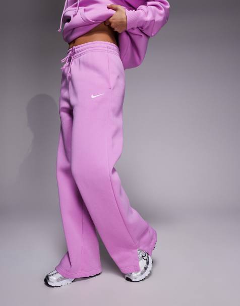 Nike – Phoenix Fleece – Jogginghose in Rosa mit weitem Bein und hohem Bund - view 1