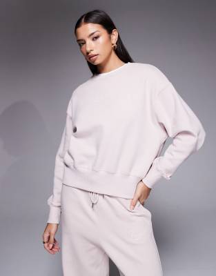 Nike - Phoenix Fleece - Oversize-Sweatshirt in Rosa