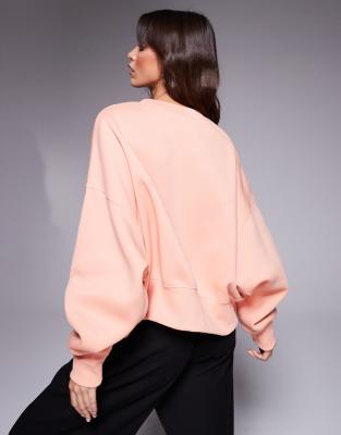 Nike Phoenix Fleece Oversized Cropped Sweatshirt In Pink