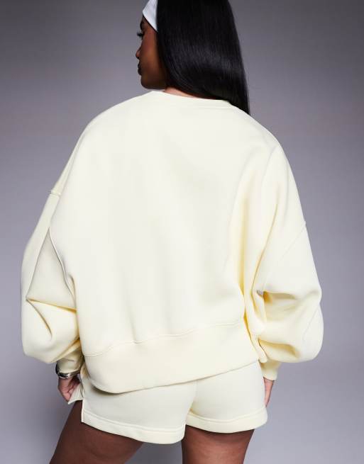 Nike Phoenix Fleece oversized cropped sweatshirt in yellow | ASOS