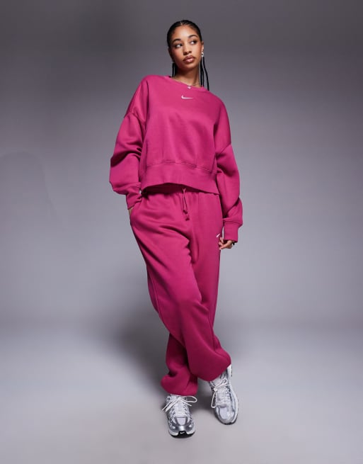 Nike Phoenix Fleece oversized joggers in pink
