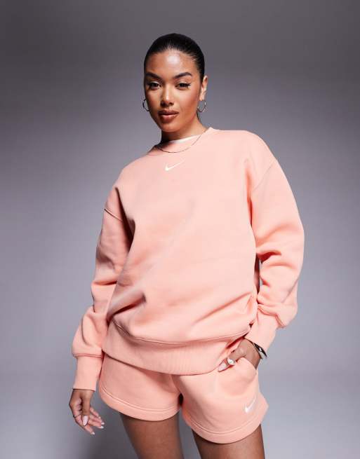 Nike Phoenix Fleece oversized longline sweatshirt in pink