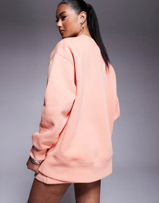 Nike Phoenix Fleece oversized longline sweatshirt in pink
