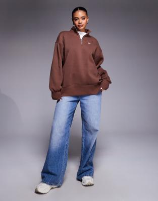 Nike Phoenix Fleece oversized quarter zip sweater in brown | ASOS