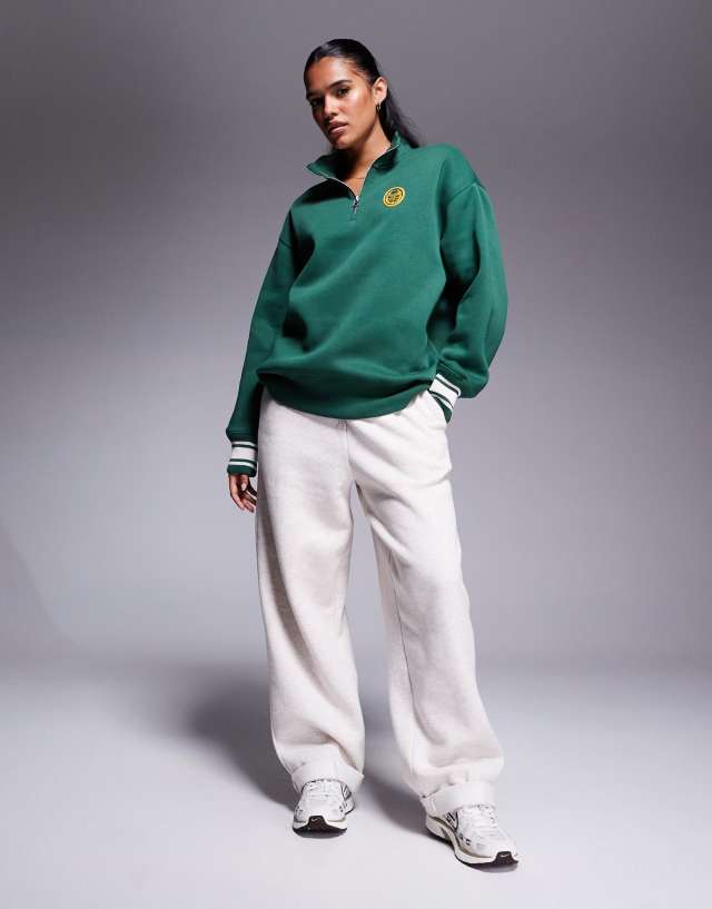 Nike Phoenix Fleece oversized quarter zip sweatshirt in dark green