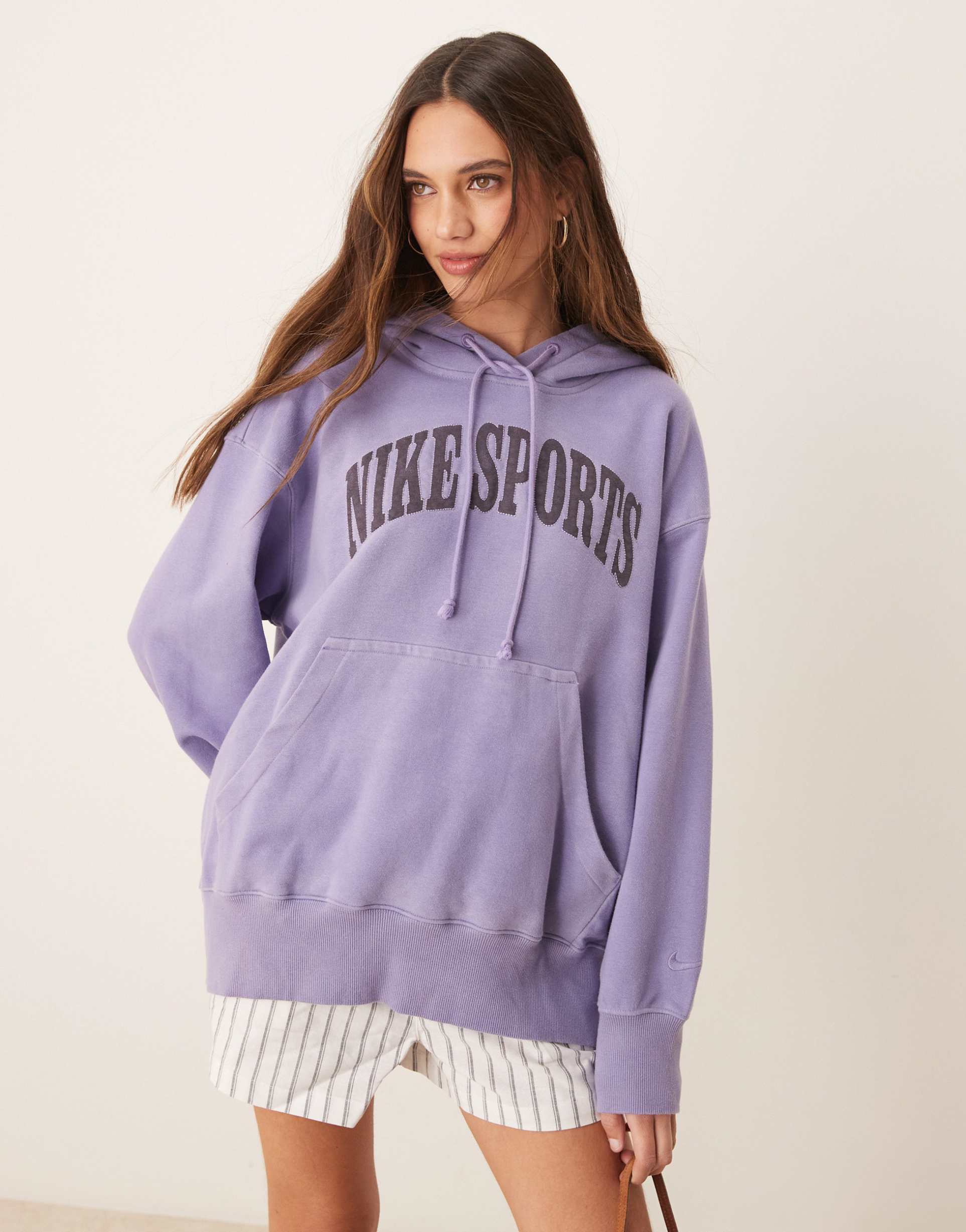 nike phoenix fleece oversized retro logo hoodie in purple wash