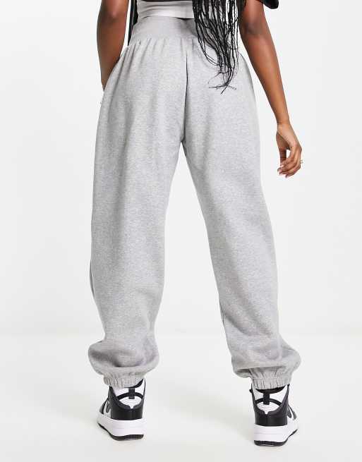 Nike Phoenix Fleece sweatpants in green - MGREEN, ASOS