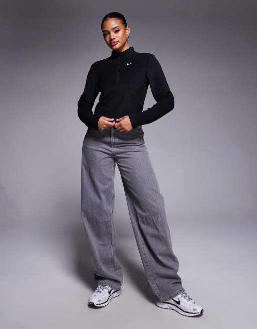 Nike Phoenix Fleece plush half zip top in black | ASOS
