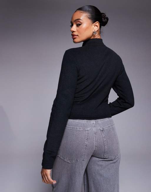 Nike Phoenix Fleece plush half zip top in black | ASOS