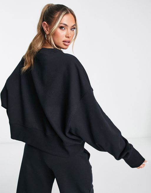 Nike Phoenix Fleece oversized sweatshirt in black