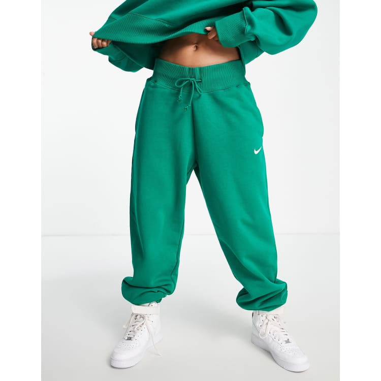 Nike Phoenix Fleece sweatpants in green - MGREEN | ASOS