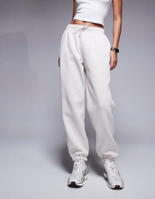 Nike Phoenix Fleece Tapered Sweatpants In Neutral