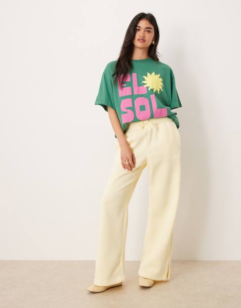 Nike Phoenix Fleece wide leg sweatpants in yellow - view 1