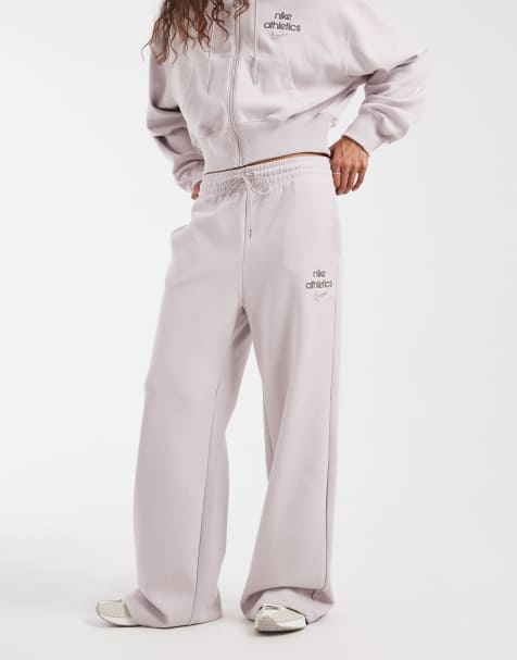 Nike – Phoenix – Ljuslila mjukisbyxor i fleece med vida ben och hög midja - view 1