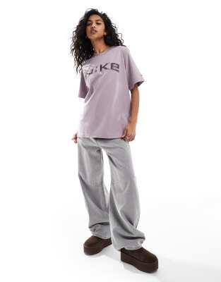 Nike Phoenix logo T-shirt in light purple | ASOS