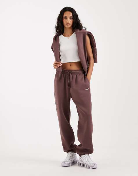 Nike - Phoenix - Oversized joggingbroek van fleece met hoge taille een aansluitende boorden in donkerpaars - view 1