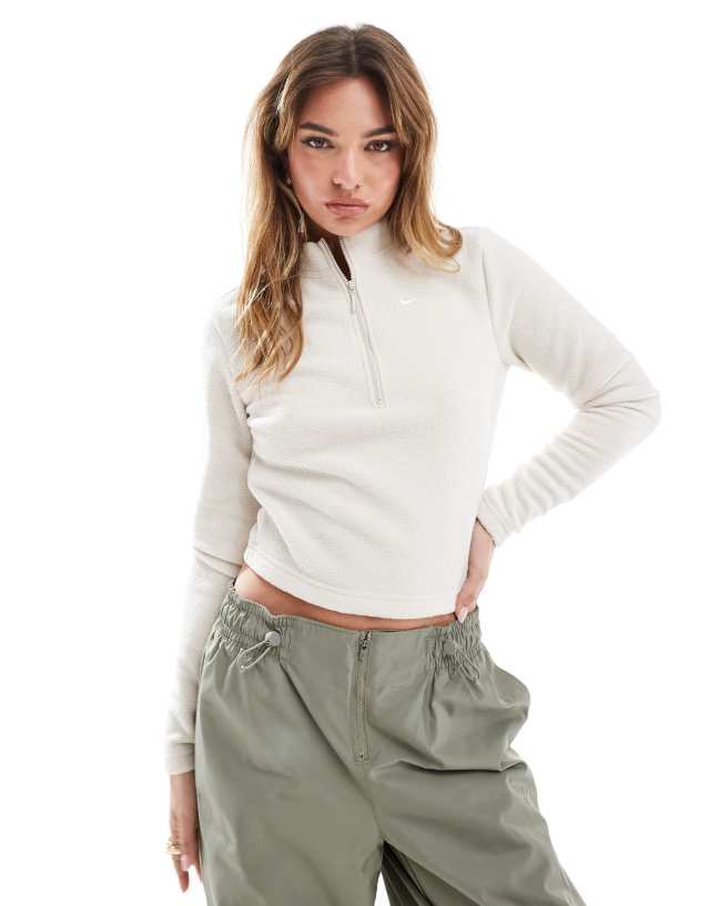 Nike Phoenix plush half zip long sleeve top in beige | ASOS