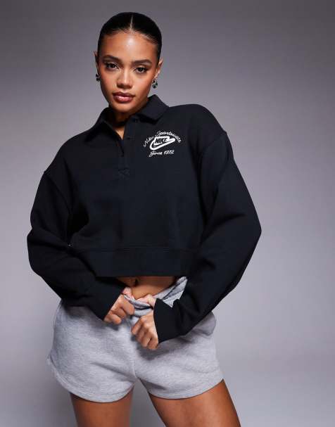 Nike Phoenix preppy polo top in black - view 1