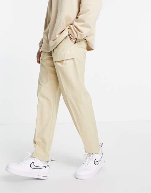 Nike woven players jogger on sale pants