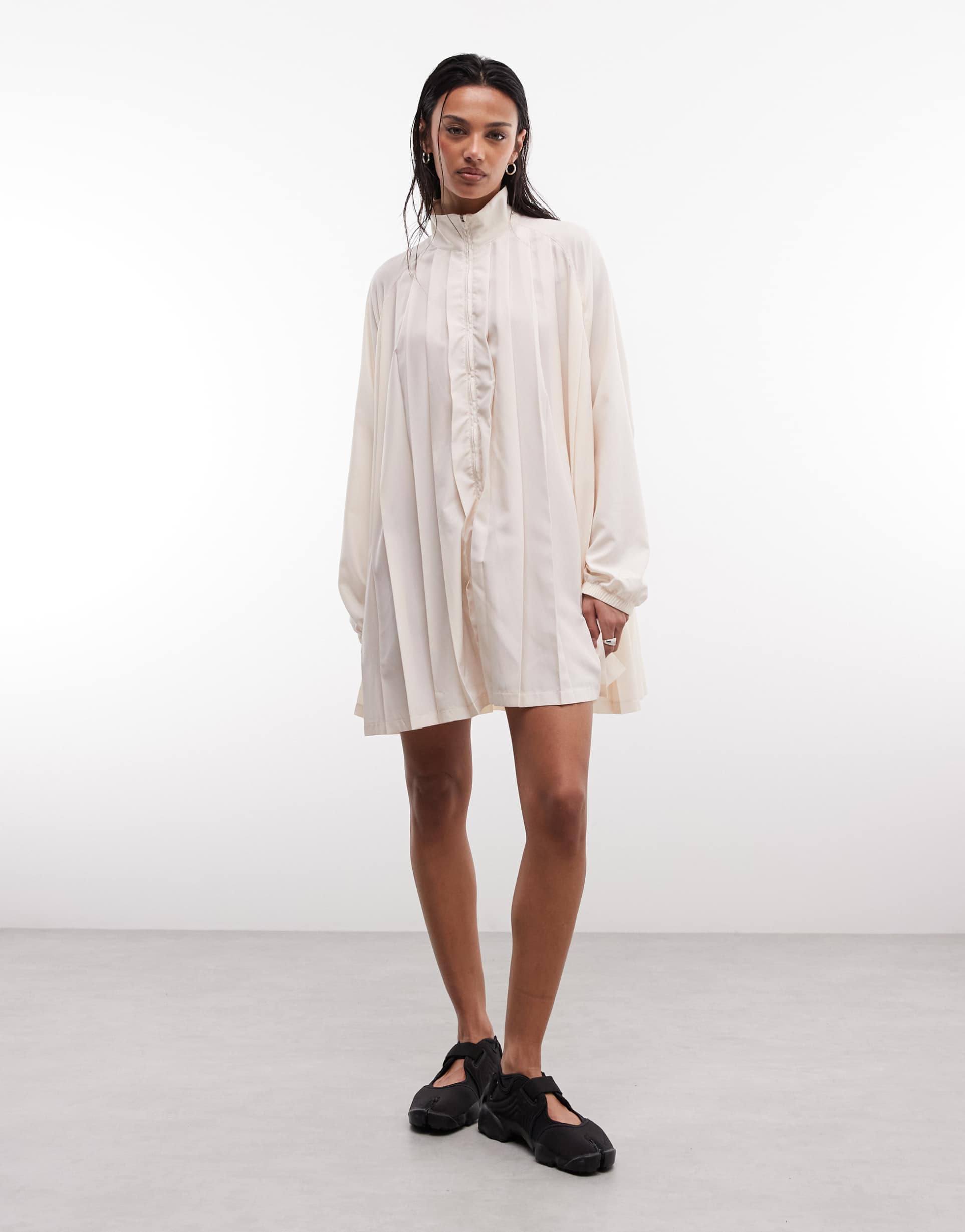 nike pleated mini dress in beige