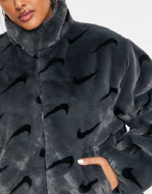 Nike Plus all over swoosh faux fur jacket in smoke grey and black