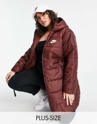 Nike Plus classic longline padded coat with hood in burgundy Purple Compare Grazia