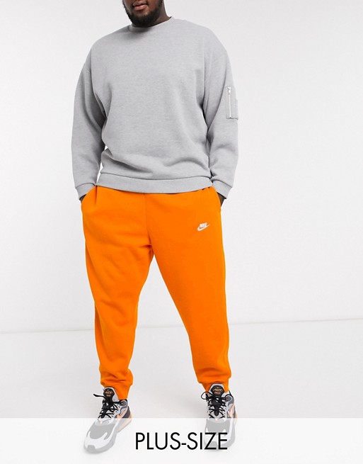 Nike Plus Club cuffed joggers in orange