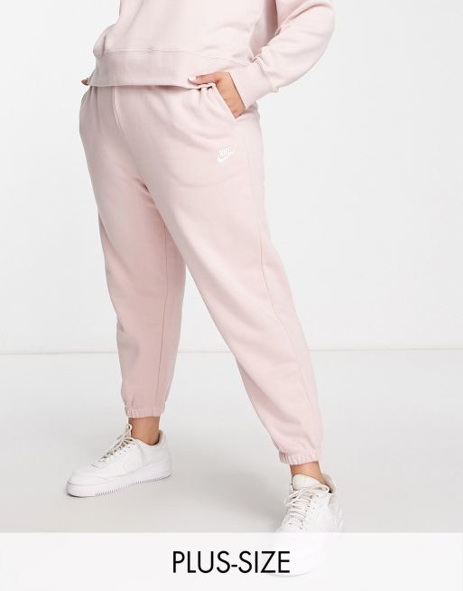 Nike Plus Club essential slim mid-rise jogger in pink