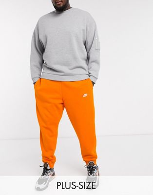 Nike Plus - Club - Joggingbroek met boorden in oranje