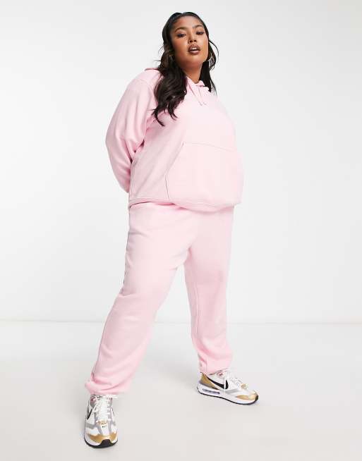 Nike Plus Club Pantalon de jogging en polaire Rose clair