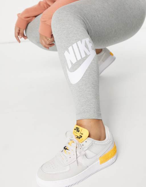 Nike Plus essential leggings in gray with futura logo print