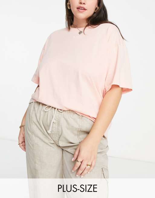 Nike Plus Essential mini swoosh boyfriend tshirt in artic orange ASOS