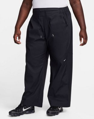 Nike Plus essential woven high rise trouser in black
