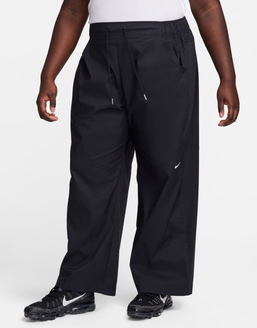 Nike Essential mid-rise woven cuffed pants in black