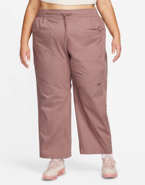 Nike Plus essential woven high rise trouser in smokey mauve - view 1