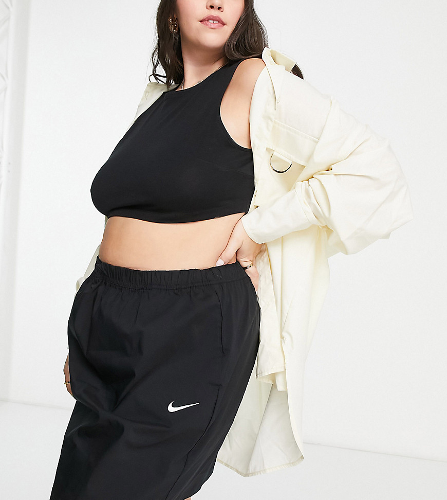 Nike Plus Essential woven high waisted skirt in black