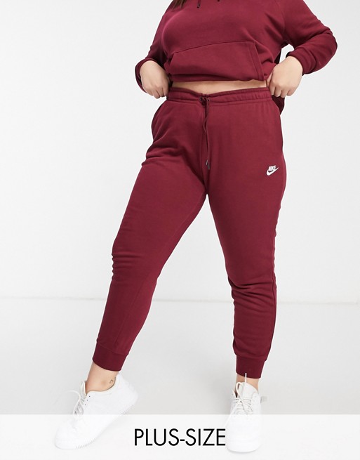 Nike Plus essentials joggers in burgundy