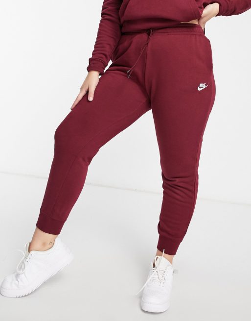 Nike Plus essentials joggers in burgundy