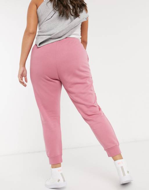 Nike essentials slim best sale joggers in dusty pink